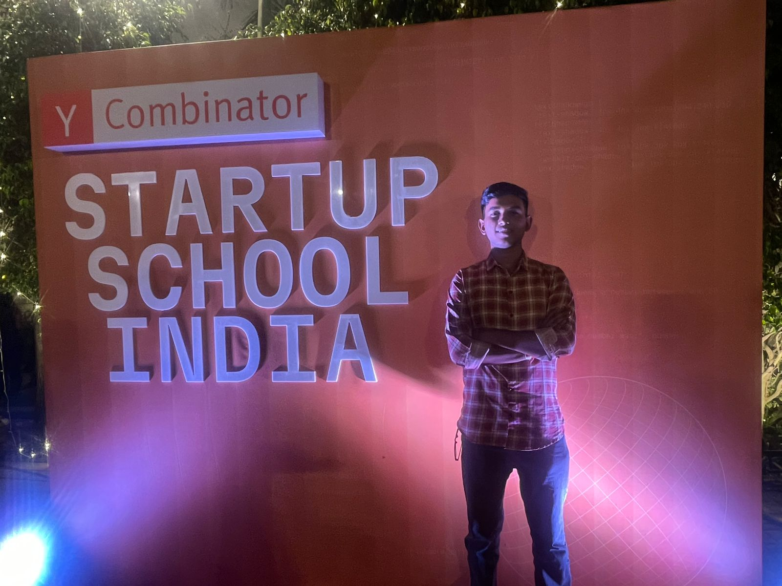 Priyanshu Gupta at the Y Combinator Startup School India 2026 backdrop.